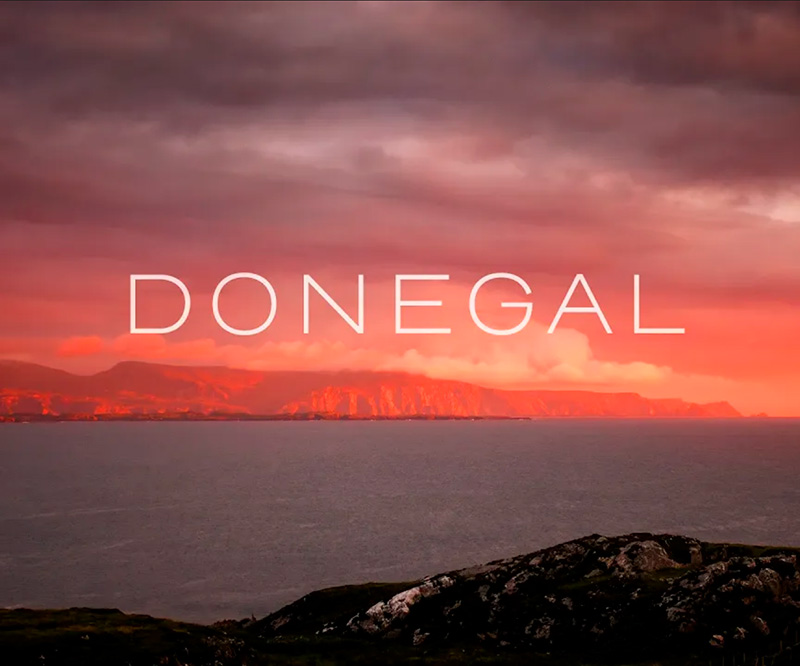 Dynamic time-lapse photography of the Donegal coastline, Ireland, with fast-moving clouds and light changes.